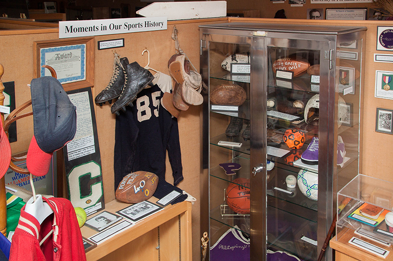 Sports section of the Museum with vintage athletic equipment dating back to the early days of the University. 